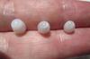 Three Flame Filled Clam Pearls 5+ carats Total Oval Shape