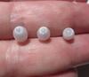 Three Flame Filled Clam Pearls 5+ carats Total Oval Shape