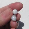 Two Natural Clam Pearls Drop and Off Round with Flame