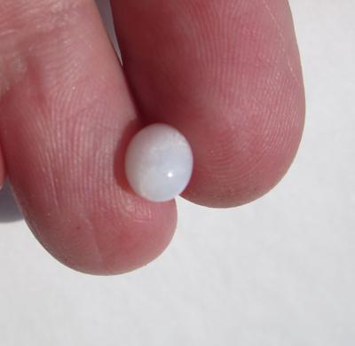 Two Carat Oval Clam Pearl with Silky Flame