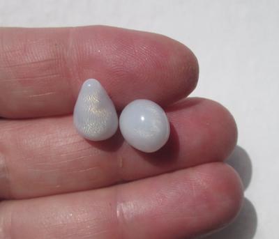 Two Natural Clam Pearls Drop and Off Round with Flame