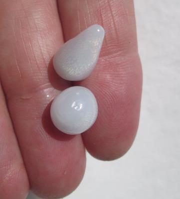 Two Natural Clam Pearls Drop and Off Round with Flame