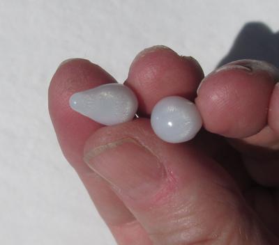Two Natural Clam Pearls Drop and Off Round with Flame