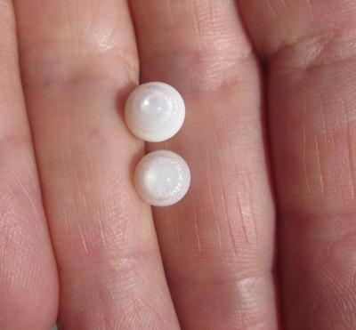 Two Natural Flame Filled Clam Pearls 4+ carats Total