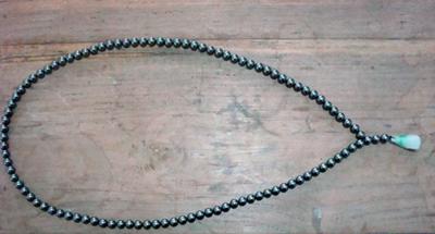 Unique Knotted Pearl Necklace