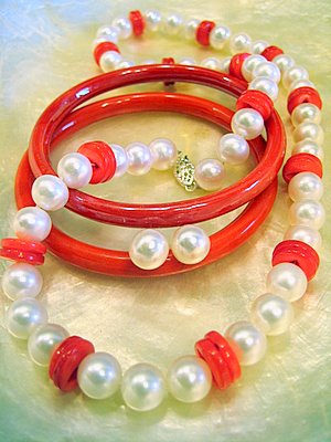 White pearls with red buttons