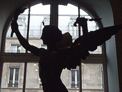 Winged Beauty by Window in Louvre